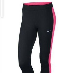 Nike 3/4 running pants. Black with pink stripes. M